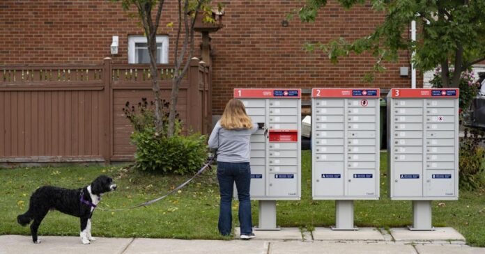 Devilish details: 53,000 Canada Post workers still in the dark on tentative deal as both sides iron out contract wording