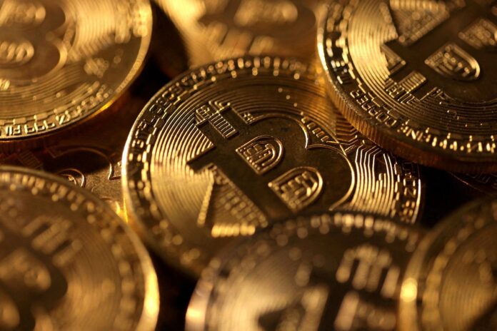 Bitcoin dips below $90,000 as AI worries dent risk appetite