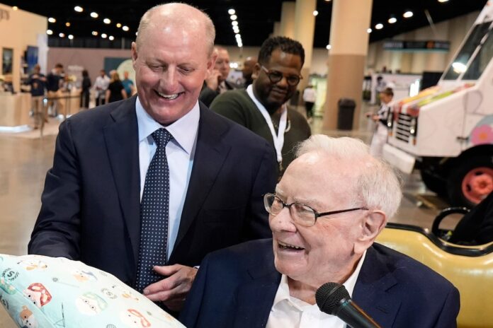 Buffett set to hand Berkshire reins to Abel, who has a tough act to follow