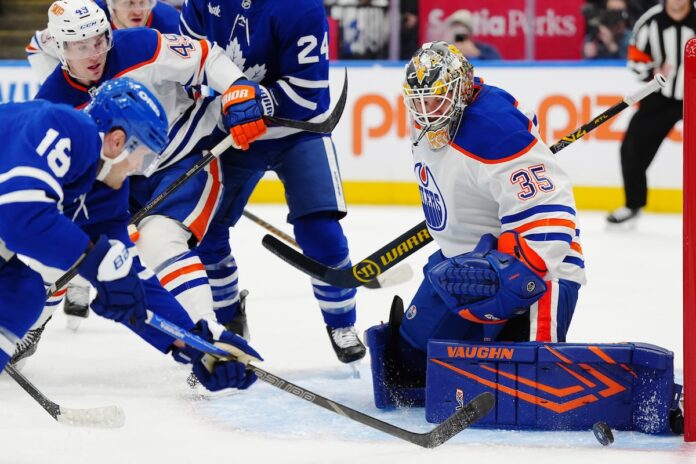 Caught off guard by trade, Jarry stands tall in net for Oilers’ debut
