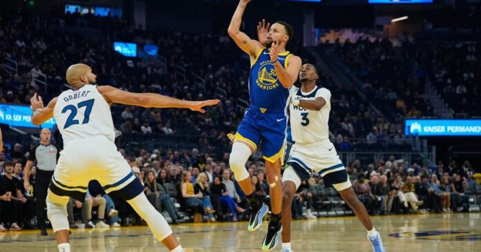 Curry scores 39 in return but Timberwolves top Warriors 127-120 without Edwards