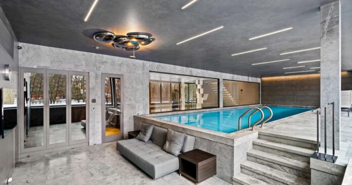 This $12-million glass house in north Toronto has a disappearing wall that turns the indoor pool into an outdoor oasis