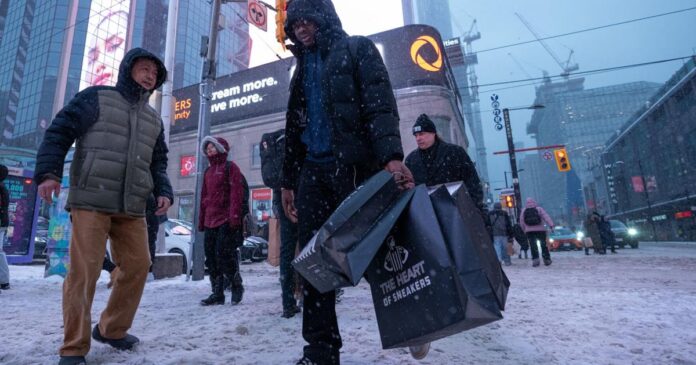 Toronto digs out after messy winter storm of snow and ice blankets region on Boxing Day