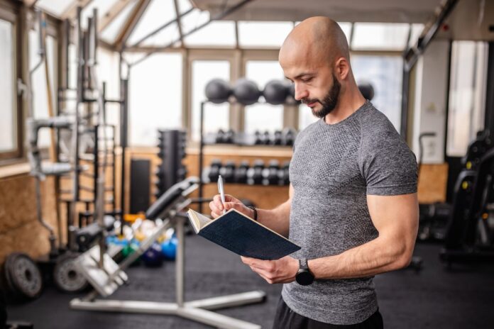 Following a workout program can help you stay committed – here’s how to write your own